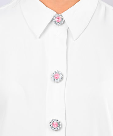 flower shaped button cover with rhinestones and a pink center by Avrel.