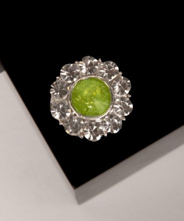 verde, flower shaped button cover with rhinestones and a green center by Avrel.