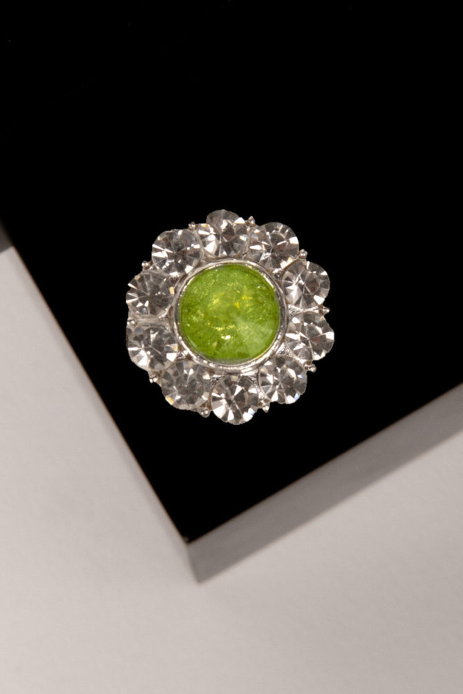 verde, flower shaped button cover with rhinestones and a green center by Avrel.