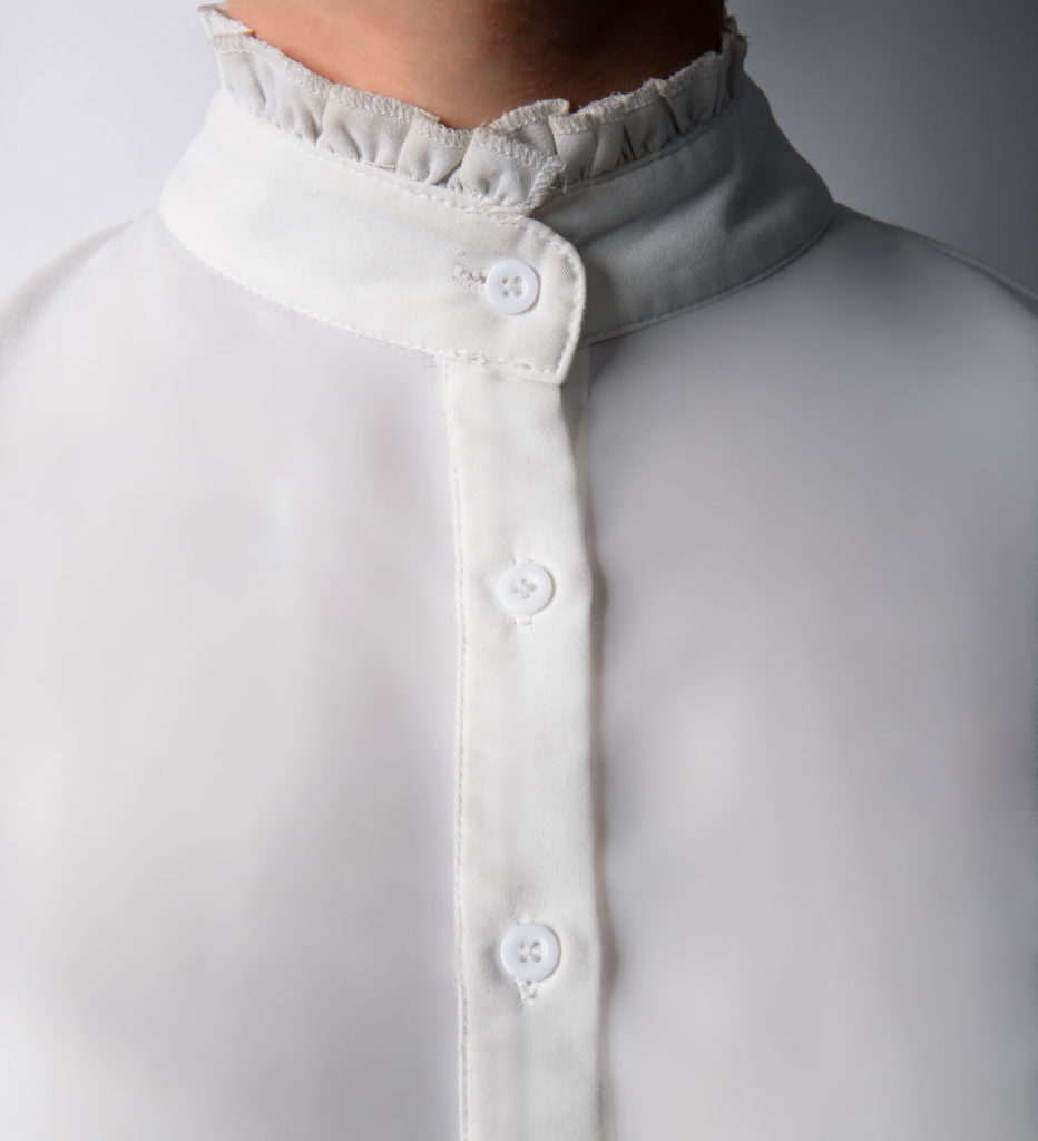 a shirt before using Avrel button cover jewelry